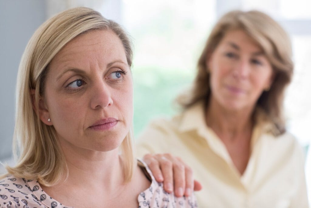 Mature Mother Concerned About Adult Daughter At Home