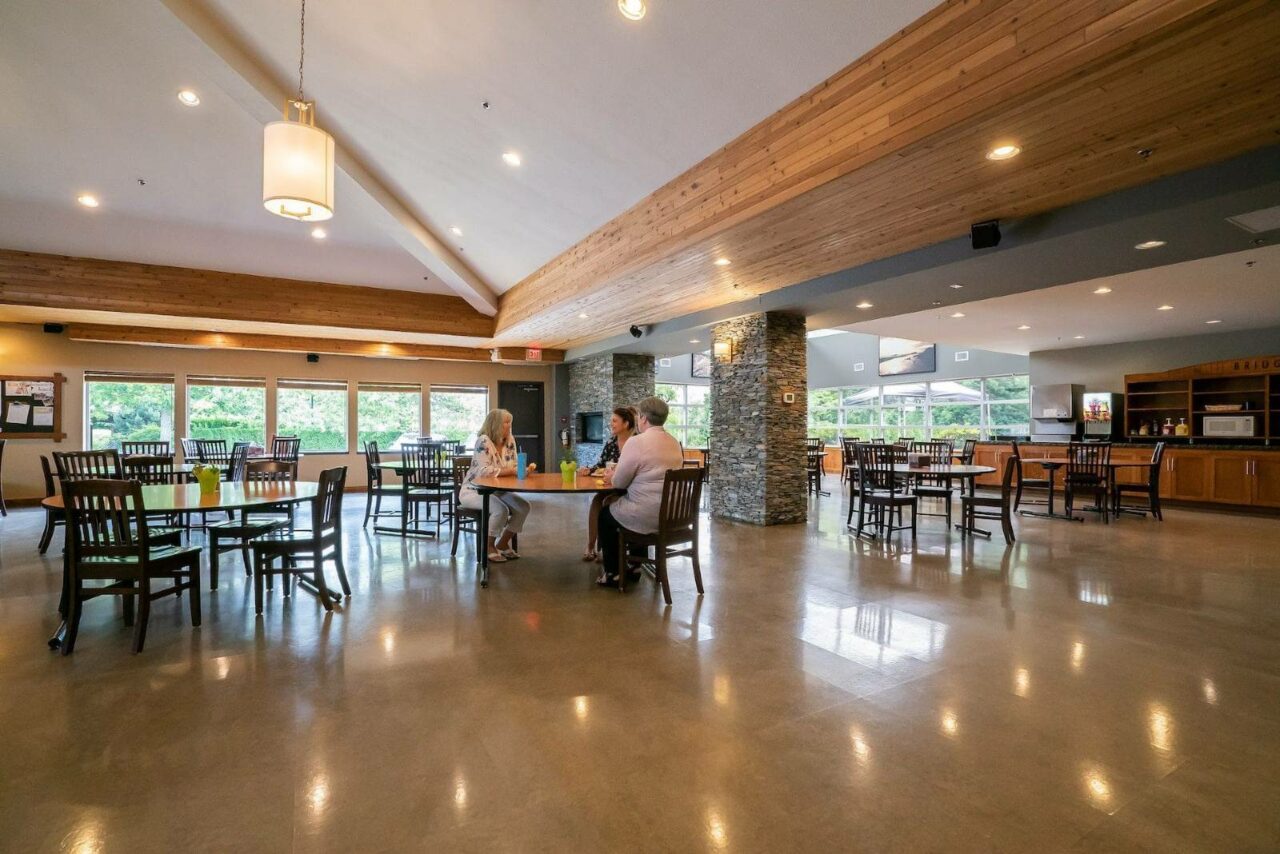 Dining room with people sitting at table