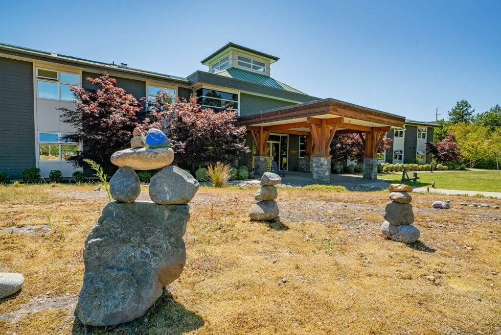 Entrance door to Edgewood Campus with rocks