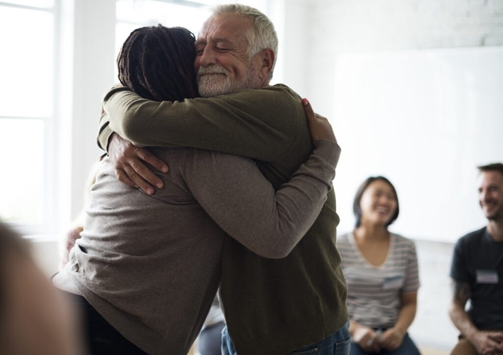 Two people hugging