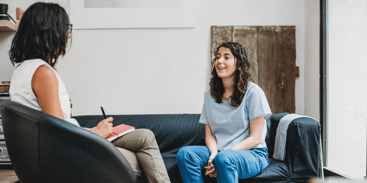 two women talking to each other
