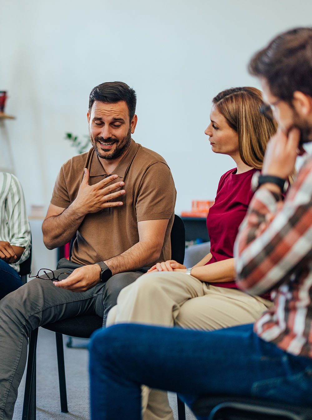 Person sharing his story on the group therapy