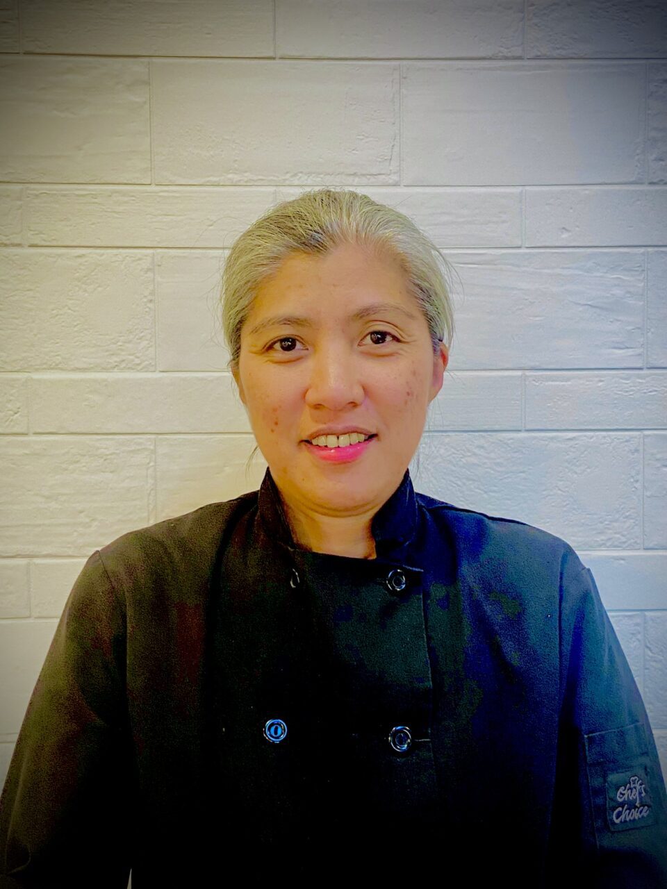 Jacquiline Negi as a cook at one of EHNs' treatment centres