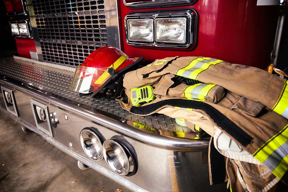Firefighter gear helmet on a truck