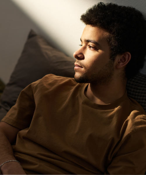 man on couch lying down