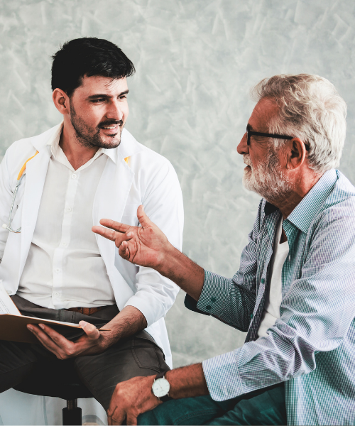 A young adult and doctor engaging in a conversation